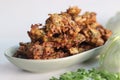 Indian cabbage fritters. Made with shredded cabbage, chickpea flour, green chilies, coriander leaves and spices. Deep fried in Royalty Free Stock Photo