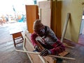 indian carpenter making wooden art object at factory in India 2020