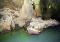 Indian Cave in Vinales, Cuba. Underground cave with stalactites and stalagmites, and river Royalty Free Stock Photo