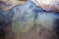 Indian Cave in Vinales, Cuba. Underground cave with stalactites and stalagmites, and river Royalty Free Stock Photo