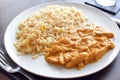 Indian chicken curry. Chicken Korma with egg fried rice on a plate. Royalty Free Stock Photo