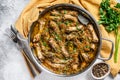 Indian Chicken Neck Curry Necks with vegetables. Gray background. Top view Royalty Free Stock Photo