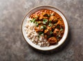 Indian Chicken Tikka Masala in a bowl with basmati rice