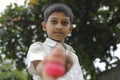 indian child playing with bhovra, Lattu, Bhovra or Bambaram is a traditional throwing top using thread, played mainly in India