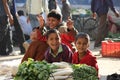Indian children smiling.