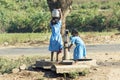 Indian children at the water pump