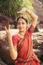 Beautiful indian woman dancer in traditional clothes at sunset Royalty Free Stock Photo