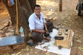 DAPOLI, MAHARASHTRA, INDIA, February 2018, Indina Cobbler works at his shop at Khed, Kokan