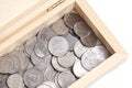 Indian coins in a wooden box