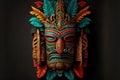 indian colorful totem tiki mask made of wood on dark background