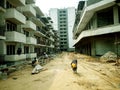 INDIAN CONSTRUCTION SITE WITH WORKING LABOURS Royalty Free Stock Photo