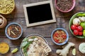 Indian cooking. In the center there is an empty frame for the text. Various vegetarian dishes made of lentils,local snacks in mult Royalty Free Stock Photo