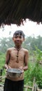 Indian country side village boy enjoying the drops of rain