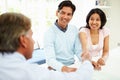 Indian Couple Meeting With Financial Advisor At Home Royalty Free Stock Photo