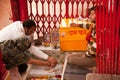 Indian couple praying inside temple