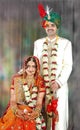 Indian couple in their wedding dress