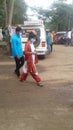 Indian couple walking towards driving training centre, Solapur