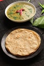Indian cuisine -Tasty dal palak and chapathi Royalty Free Stock Photo