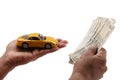 Indian currency notes and toy car in the hands bank loan concept Royalty Free Stock Photo