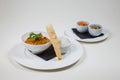 Indian Curry in a white bowl with rice on a white plate on a white background isolated Royalty Free Stock Photo