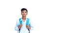 indian cute kid or boy leaving or going to school with small school bag, isolated over white background Royalty Free Stock Photo