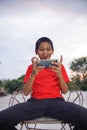 Indian Cute Little Boy With Cellphone Royalty Free Stock Photo