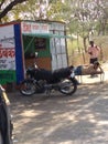 Indian reparing shop with sleeping man