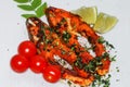 An Indian delicacy spicy Tawa fish platter