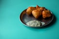 Indian delicious mysore bonda with chutney for a healthy evening snack Royalty Free Stock Photo