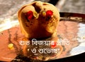 Indian delicious sweets background with Bengali Text Subho Bijoya Happy Dussehra. Royalty Free Stock Photo