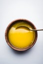 Indian or desi ghee or pure ghee served in a wooden bowl Royalty Free Stock Photo