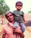 This is Indian Desi man who take his daughter on shoulder