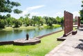 The indian design carving screen near the pond