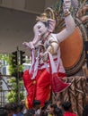 Indian devotees carry a huge idol of the elephant headed Hindu God Lord Ganesha in chinchpokali Lalbag Mumba