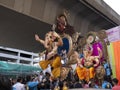 Indian devotees carry a huge idol of the elephant headed Hindu God Lord Ganesha in chinchpokali Lalbag Mumbai