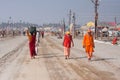 Indian devotees walking to holy Sangam