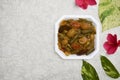 Indian dish Bhindi do pyaza top view, Ladyfinger or Okra home cooked with onions, tomatoes and masala spices, red chilles.