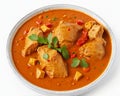 Indian Dish of Chicken curry in red curry, Isolated on white background Royalty Free Stock Photo