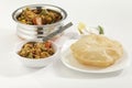 Indian dish Mixed vegetables along with Puri the fried Indian bread.