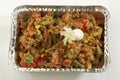 Indian dish Mixed vegetables in metal foil tray.
