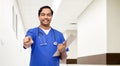 indian doctor or male nurse pointing to camera Royalty Free Stock Photo