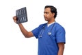 indian doctor or male nurse with x-ray Royalty Free Stock Photo