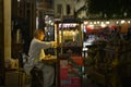 Indian expatriate repairing watches in Souq Wakif, Doha