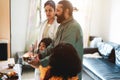 Indian family celebrating religion hindu event at home - Southern asian cultures and lifestyle concept - Focus on man face