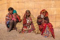 An Indian family in colorful saris