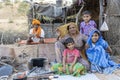 Indian family outdoors in desert on time Pushkar Camel Mela, Rajasthan, India Royalty Free Stock Photo