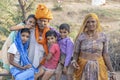 Indian family outdoors in desert on time Pushkar Camel Mela, Rajasthan, India Royalty Free Stock Photo