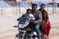 Indian family rides a motorbike Royalty Free Stock Photo