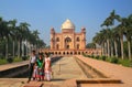 Indian family standing in front of Tomb of Safdarjung in New Del Royalty Free Stock Photo