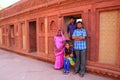 Indian family standing in Jahangiri Mahal in Agra Fort, Uttar Pr